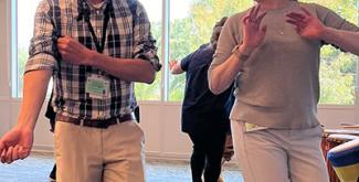 adults dancing at meeting